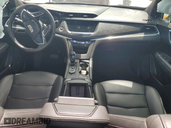 2021 Cadillac XT5 FWD Premium Luxury z VIN 1GYKNCR44MZ106982, wystawiony jako Copart lot #62234455 z przebiegiem 93 079 mil mil oraz Szkoda całkowita • Salvage title. Historia ofert i sprzedaży dostępna na DreamBid. Obrazek 8.