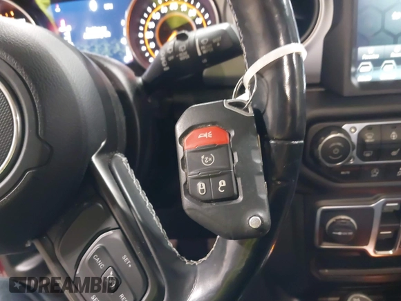 2021 Jeep Wrangler Unlimited Sport S with VIN 1C4HJXDN1MW596334, listed as a IAAI auction lot 41730278 with 64,126 mi miles and . Bid and sale history available at DreamBid. Image 11.
