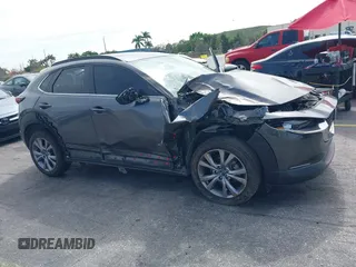 2021 Mazda CX-30 Preferred with VIN 3MVDMACLXMM228431, listed as a IAAI auction lot 41575602 with 67,854 mi miles. Bid and sale history available at carsss.com. Image 6.