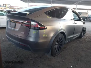 2022 Tesla Model X Plaid z VIN 7SAXCBE69NF352875, wystawiony jako IAAI lot #41964970 z przebiegiem 34 065 mil mil oraz . Historia ofert i sprzedaży dostępna na DreamBid. Obrazek 4.