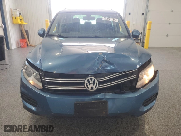 2017 Volkswagen Tiguan Wolfsburg Edition with VIN WVGSV7AX8HK014738, listed as a Copart auction lot 62255775 with 123,768 mi miles and Salvage title. Bid and sale history available at DreamBid. Image 5.