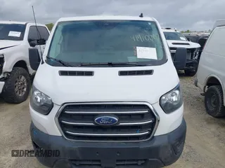2020 Ford Transit Cargo with VIN 1FTBR1Y85LKA70004, listed as a IAAI auction lot 41910007 with 115,005 mi miles and . Bid and sale history available at DreamBid. Image 12.