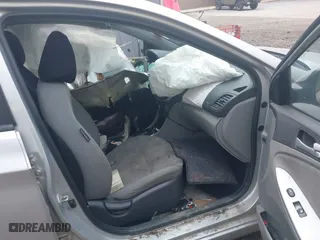 2014 Hyundai Accent GLS with VIN KMHCT4AE5EU597325, listed as a IAAI auction lot 42005445 with 1 mi miles. Bid and sale history available at carsss.com. Image 5.