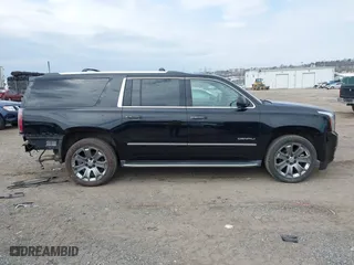 2016 GMC Yukon XL Denali with VIN 1GKS2HKJ8GR139858, listed as a IAAI auction lot 41915183 with 151,830 mi miles. Bid and sale history available at carsss.com. Image 14.