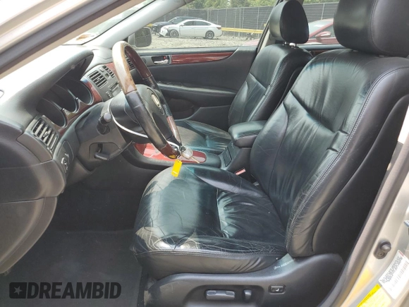 2002 Lexus ES 300 with VIN JTHBF30G520020588, listed as a Copart auction lot 59204865 with 218,670 mi miles and Salvage title. Bid and sale history available at DreamBid. Image 7.