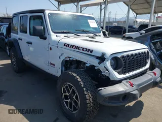 2024 Jeep Wrangler Rubicon with VIN 1C4PJXFG1RW300794, listed as a IAAI auction lot 42784578 with 22,652 mi miles and . Bid and sale history available at DreamBid. Image 1.