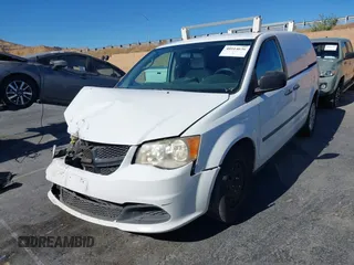 2014 Ram Cargo Van Tradesman with VIN 2C4JRGAG3ER379605, listed as a IAAI auction lot 40914636 with 156,793 mi miles. Bid and sale history available at carsss.com. Image 2.