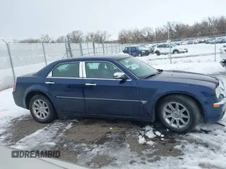 2006 Chrysler 300 C with VIN 2C3LA63H96H289693, listed as a IAAI auction lot 41308366 with 128,814 mi miles. Bid and sale history available at carsss.com. Image 14.