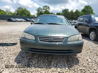 2000 Toyota Camry CE z VIN 4T1BG22K0YU708702, wystawiony jako Copart lot #56755285 z przebiegiem 318 734 mil mil oraz Szkoda całkowita • Salvage title. Historia ofert i sprzedaży dostępna na DreamBid. Obrazek 5.