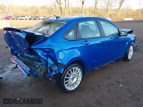 2011 Ford Focus SES with VIN 1FAHP3GN8BW165687, listed as a IAAI auction lot 41854781 with 153,445 mi miles. Bid and sale history available at carsss.com. Image 4.