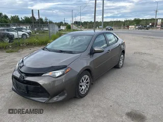 2019 Toyota Corolla L z VIN 2T1BURHE5KC220051, wystawiony jako Copart lot #61879415 z przebiegiem 196 200 mil mil oraz Czysty tytuł • Clean title. Historia ofert i sprzedaży dostępna na DreamBid. Obrazek 2.