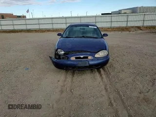 1996 Mercury Sable GS z VIN 1MELM50U3TA659219, wystawiony jako Copart lot #74373944 z przebiegiem 156 398 mil mil oraz Szkody całkowita. Historia ofert i sprzedaży dostępna na DreamBid. Obrazek 11.