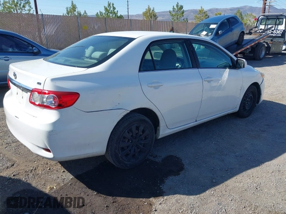 2013 Toyota Corolla L with VIN 5YFBU4EE2DP125215, listed as a IAAI auction lot 42158224 with 196,550 mi miles. Bid and sale history available at carsss.com. Image 4.