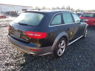 2014 Audi allroad Premium Plus with VIN WA1UFAFL1EA156213, listed as a IAAI auction lot 41610274 with 115,688 mi miles. Bid and sale history available at carsss.com. Image 4.