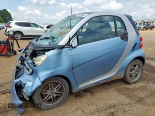 2011 Smart fortwo Pure z VIN WMEEJ3BA0BK432896, wystawiony jako Copart lot #59809555 z przebiegiem 117 220 mil mil oraz Szkoda całkowita • Salvage title. Historia ofert i sprzedaży dostępna na DreamBid. Obrazek 1.