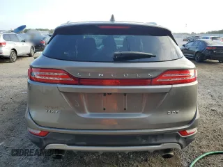 2017 Lincoln MKC Premiere z VIN 5LMCJ1C95HUL16078, wystawiony jako Copart lot #55853005 z przebiegiem 114 821 mil mil oraz Szkoda całkowita • Salvage title. Historia ofert i sprzedaży dostępna na DreamBid. Obrazek 6.