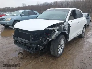 2021 Audi Q3 S line Premium Plus with VIN WA1EECF3XM1020244, listed as a IAAI auction lot 41673299 with 57,731 mi miles. Bid and sale history available at carsss.com. Image 18.