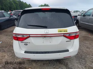 2012 Honda Odyssey Touring with VIN 5FNRL5H93CB034485, listed as a IAAI auction lot 42304502 with 198,589 mi miles and . Bid and sale history available at DreamBid. Image 16.