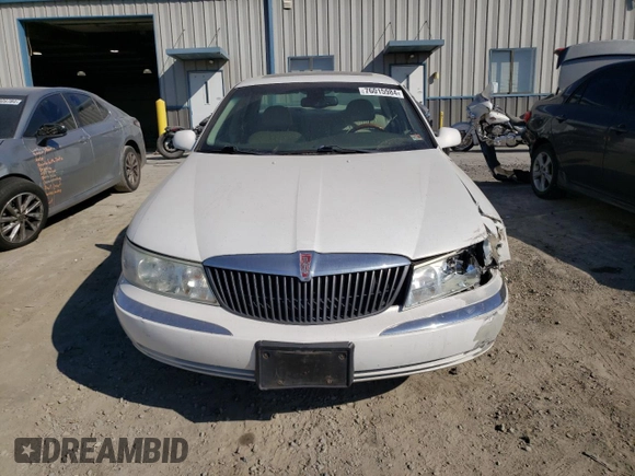 2002 Lincoln Continental with VIN 1LNHM97V62Y643532, listed as a Copart auction lot 76015984 with 154,374 mi miles and Salvage Title. Bid and sale history available at carsss.com. Image 5.