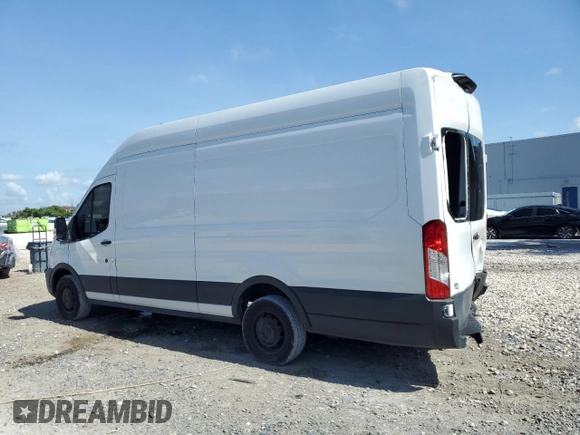 2021 Ford Transit Cargo with VIN 1FTBR3X83MKA58920, listed as a Copart auction lot 59946095 with 65,655 mi miles and Salvage title. Bid and sale history available at DreamBid. Image 2.