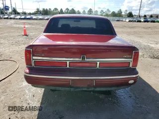 1996 Lincoln Town Car Signature z VIN 1LNLM82W3TY725921, wystawiony jako Copart lot #72569054 z przebiegiem 109 073 mil mil oraz Szkody całkowita. Historia ofert i sprzedaży dostępna na DreamBid. Obrazek 6.
