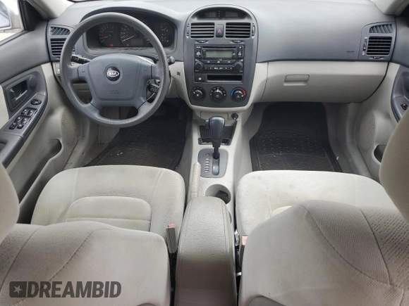 2006 Kia Spectra EX z VIN KNAFE121565316347, wystawiony jako Copart lot #57169865 z przebiegiem 82 782 mil mil oraz Czysty tytuł • Clean title. Historia ofert i sprzedaży dostępna na DreamBid. Obrazek 8.