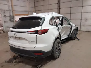 2016 Mazda CX-9 Touring with VIN JM3TCBCY3G0114707, listed as a IAAI auction lot 42023034 with 225,281 mi miles and . Bid and sale history available at DreamBid. Image 6.