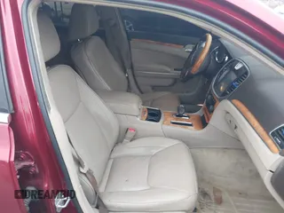 2013 Chrysler 300 C with VIN 2C3CCAEG4DH698893, listed as a IAAI auction lot 41189845 with 153,638 mi miles and . Bid and sale history available at DreamBid. Image 5.
