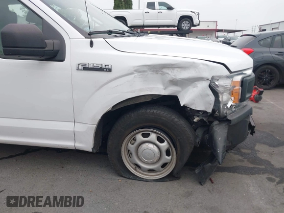 2018 Ford F-150 XL with VIN 1FTEX1CP5JKE02604, listed as a IAAI auction lot 42490050 with 171,521 mi miles and . Bid and sale history available at DreamBid. Image 17.