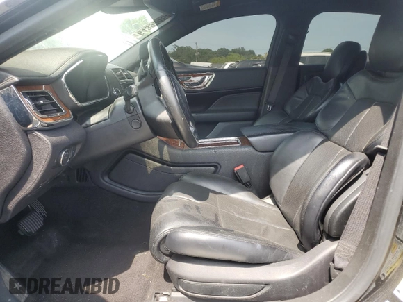 2017 Lincoln Continental Reserve z VIN 1LN6L9NC1H5605714, wystawiony jako Copart lot #64392454 z przebiegiem Nie podano mil oraz Szkoda całkowita • Salvage title. Historia ofert i sprzedaży dostępna na DreamBid. Obrazek 7.