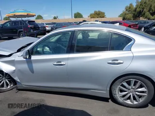 2015 Infiniti Q50 Premium with VIN JN1BV7AP8FM339334, listed as a IAAI auction lot 41956950 with 99,945 mi miles. Bid and sale history available at carsss.com. Image 14.
