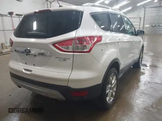 2014 Ford Escape Titanium with VIN 1FMCU9J90EUD21552, listed as a IAAI auction lot 42102148 with 183,539 mi miles. Bid and sale history available at carsss.com. Image 4.