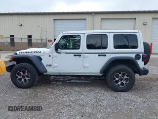 2021 Jeep Wrangler Unlimited Rubicon with VIN 1C4JJXFM9MW774142, listed as a IAAI auction lot 42625007 with 42,318 mi miles and . Bid and sale history available at DreamBid. Image 14.