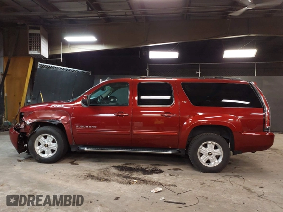 2010 Chevrolet Suburban LT z VIN 1GNUKJE32AR106197, wystawiony jako IAAI lot #42378134 z przebiegiem 106 479 mil mil oraz . Historia ofert i sprzedaży dostępna na DreamBid. Obrazek 15.