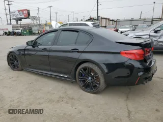 2020 BMW M5 z VIN WBSJF0C02LCE10800, wystawiony jako Copart lot #60674545 z przebiegiem Nie podano mil oraz Szkoda całkowita • Salvage title. Historia ofert i sprzedaży dostępna na DreamBid. Obrazek 2.