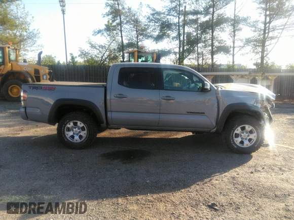 2020 Toyota Tacoma SR5 z VIN 3TMCZ5AN6LM330074, wystawiony jako IAAI lot #41982461 z przebiegiem 43 756 mil mil oraz . Historia ofert i sprzedaży dostępna na DreamBid. Obrazek 14.