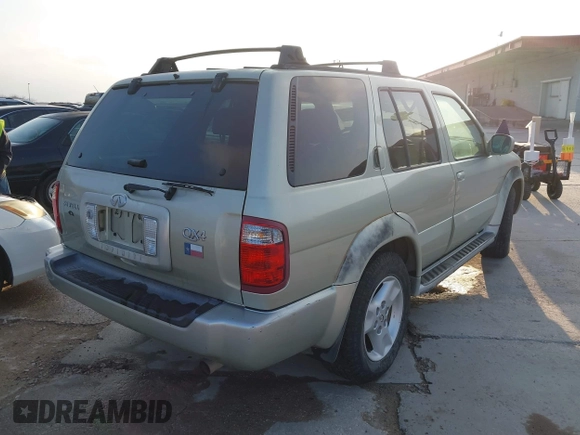 2001 Infiniti QX4 Luxury z VIN JNRDR07XX1W101118, wystawiony jako IAAI lot #41798112 z przebiegiem 184 082 mil mil oraz . Historia ofert i sprzedaży dostępna na DreamBid. Obrazek 4.