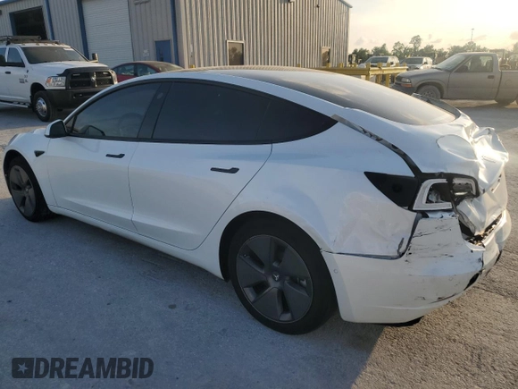 2022 Tesla Model 3 Long Range with VIN 5YJ3E1EB2NF201275, listed as a Copart auction lot 51952345 with 43,540 mi miles and Salvage Title. Bid and sale history available at DreamBid. Image 2.