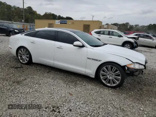 2013 Jaguar XJ with VIN SAJWA2GB8DLV52975, listed as a Copart auction lot 79123644 with 160,473 mi miles and Salvage Title. Bid and sale history available at carsss.com. Image 4.