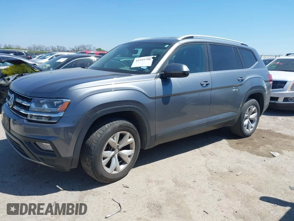 2018 Volkswagen Atlas SE with VIN 1V2CR2CA2JC576397, listed as a IAAI auction lot 41959708 with 168,619 mi miles and . Bid and sale history available at DreamBid. Image 2.
