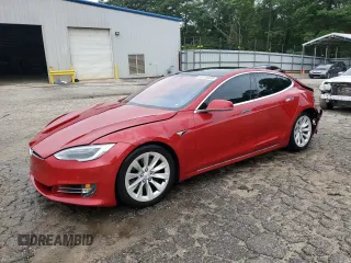 2017 Tesla Model S 100D with VIN 5YJSA1E29HF227884, listed as a Copart auction lot 59135835 with 124,129 mi miles and Salvage title. Bid and sale history available at DreamBid. Image 1.