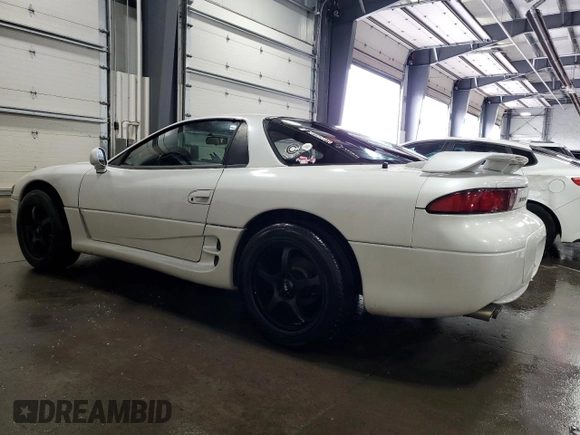 1996 Mitsubishi 3000GT GT z VIN JA3AM84J5TY002387, wystawiony jako Copart lot #64983534 z przebiegiem 149 380 mil mil oraz Szkoda całkowita • Salvage title. Historia ofert i sprzedaży dostępna na DreamBid. Obrazek 2.