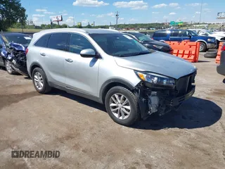 2018 Kia Sorento LX with VIN 5XYPG4A5XJG394663, listed as a IAAI auction lot 40222497 with 125,838 mi miles and . Bid and sale history available at DreamBid. Image 1.