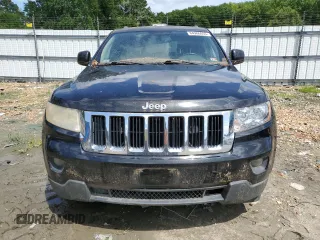 2011 Jeep Grand Cherokee Laredo with VIN 1J4RR4GG7BC512633, listed as a Copart auction lot 64906055 with 233,036 mi miles and Clean title. Bid and sale history available at DreamBid. Image 5.