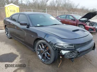 2017 Dodge Charger R/T with VIN 2C3CDXCTXHH556893, listed as a IAAI auction lot 41297752 with 106,632 mi miles and . Bid and sale history available at DreamBid. Image 1.
