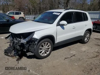 2018 Volkswagen Tiguan with VIN WVGBV7AX0JK005814, listed as a Copart auction lot 48738595 with 90,604 mi miles and Salvage Title. Bid and sale history available at DreamBid. Image 1.