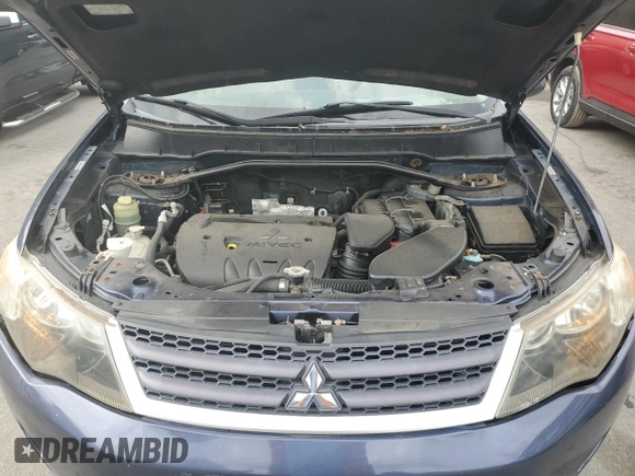2009 Mitsubishi Outlander SE with VIN JA4MT31W89Z001770, listed as a Copart auction lot 70411544 with 161,549 mi miles and Salvage title. Bid and sale history available at DreamBid. Image 12.