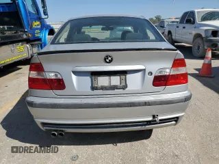 2003 BMW 3 Series 330xi with VIN WBAEW53413PG09450, listed as a Copart auction lot 74111954 with 252,295 mi miles and Salvage Title. Bid and sale history available at carsss.com. Image 6.