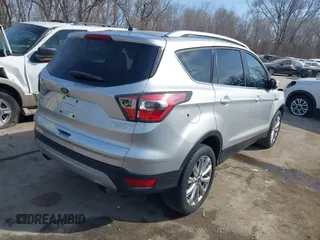2017 Ford Escape Titanium with VIN 1FMCU0JD3HUB13234, listed as a IAAI auction lot 41760944 with 113,361 mi miles. Bid and sale history available at carsss.com. Image 4.