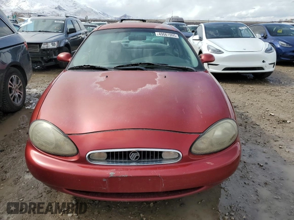1999 Mercury Sable GS with VIN 1MEFM50U8XA606034, listed as a Copart auction lot 49061995 with 245,641 mi miles and Salvage Title. Bid and sale history available at DreamBid. Image 5.
